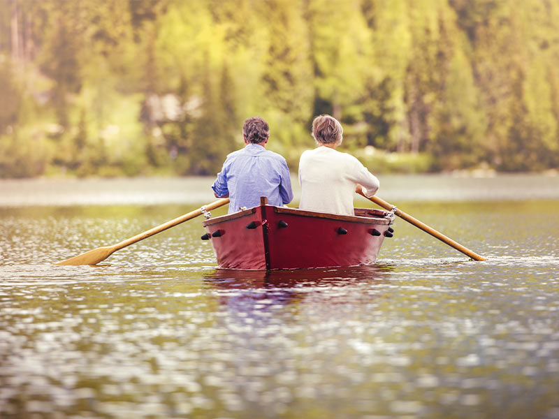 senior couple kayaking simple retirement options