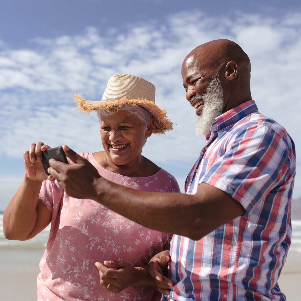 happy smiling couple on beach what is a fixed index annuity florida